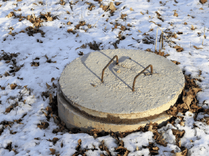 Picture of an exposed septic tank lid