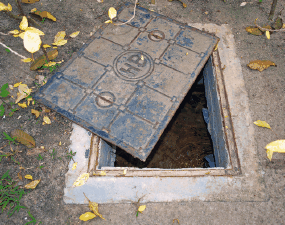 septic tank lid that has been uncovered.